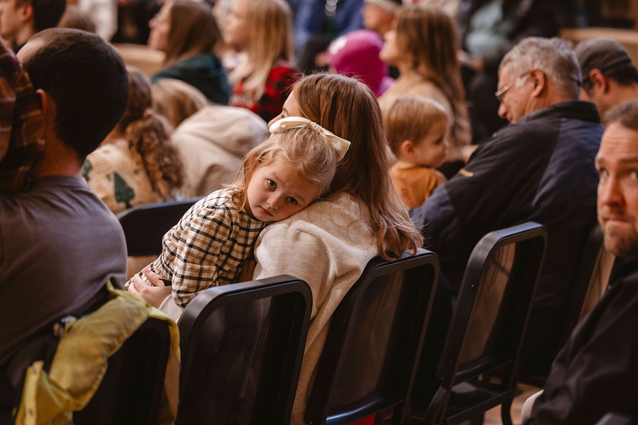 mom and girl in audience