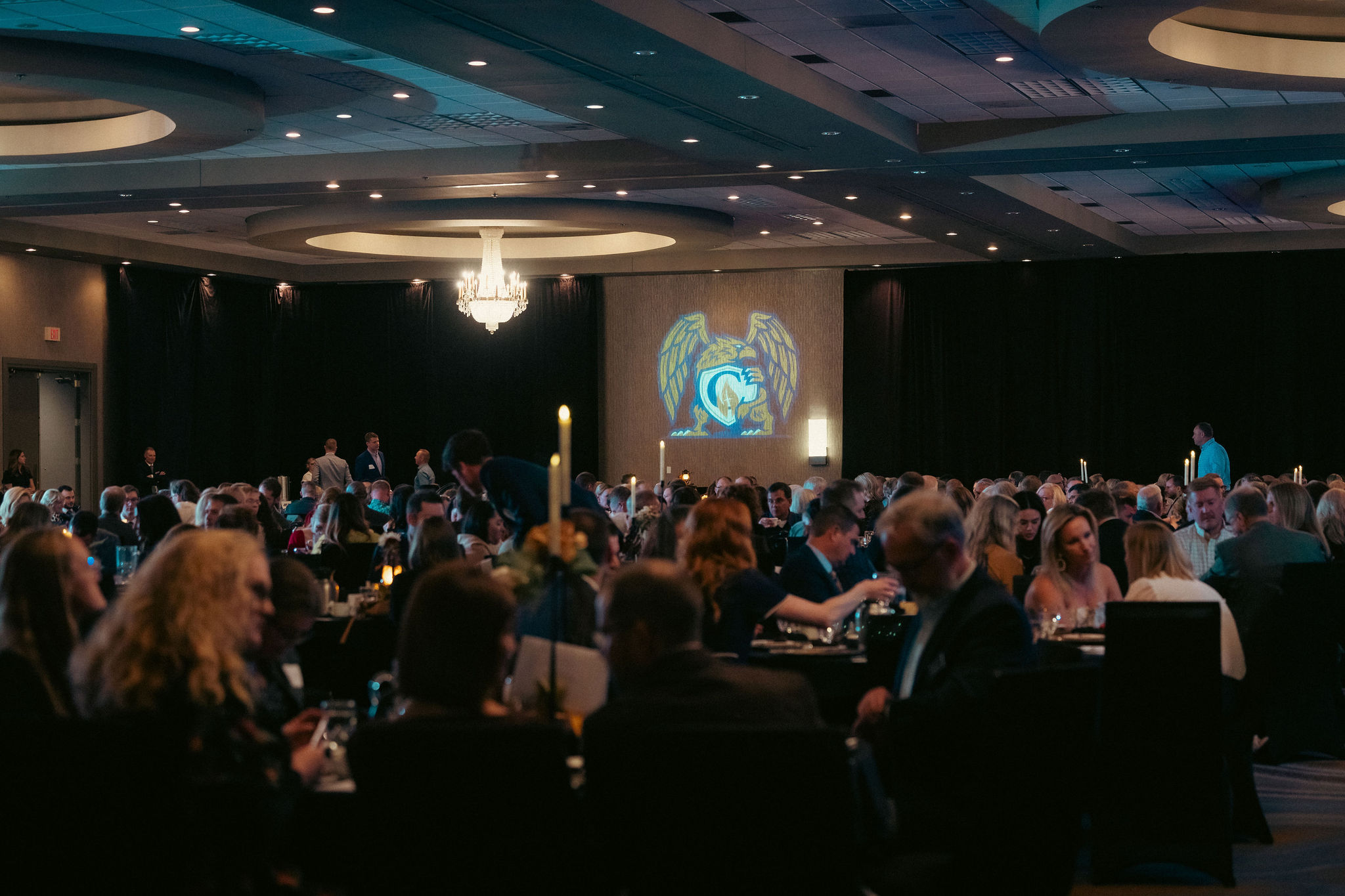 gryphon society logo over colloquium