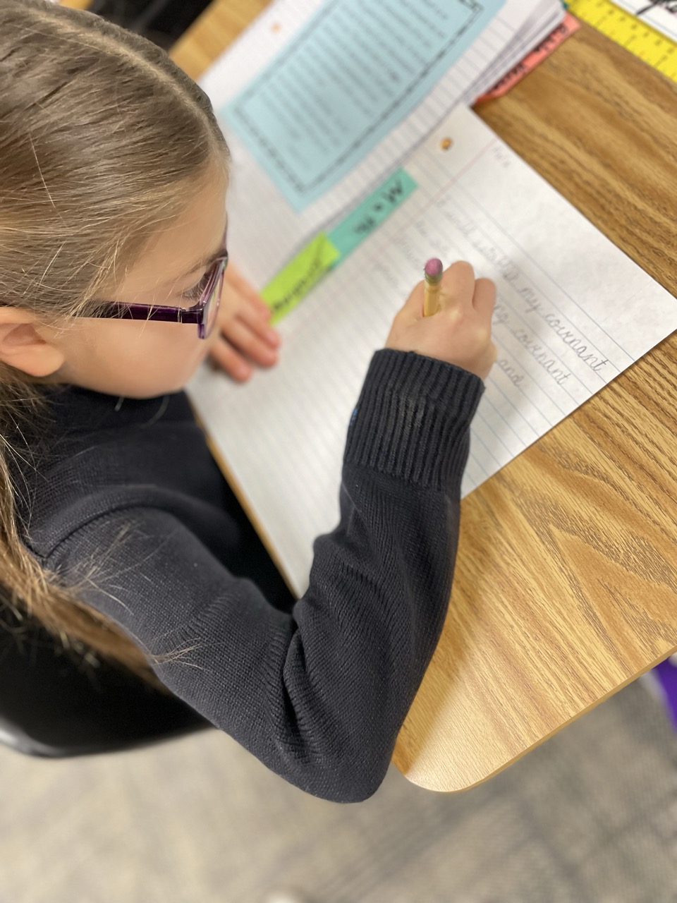 Girl practicing cursive handwriting