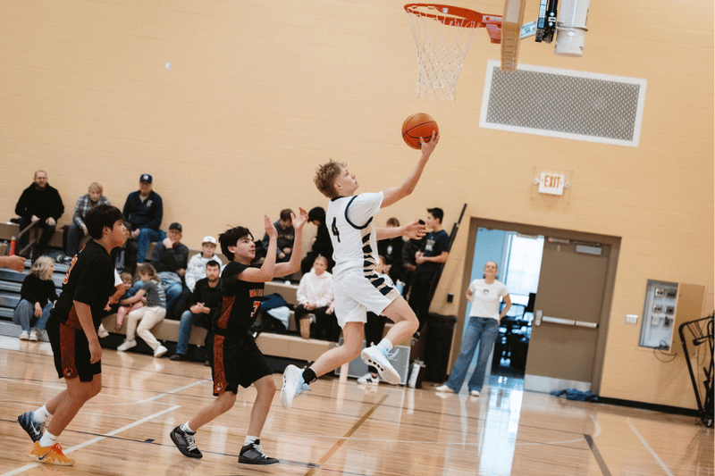 Young Man Playing Basketball