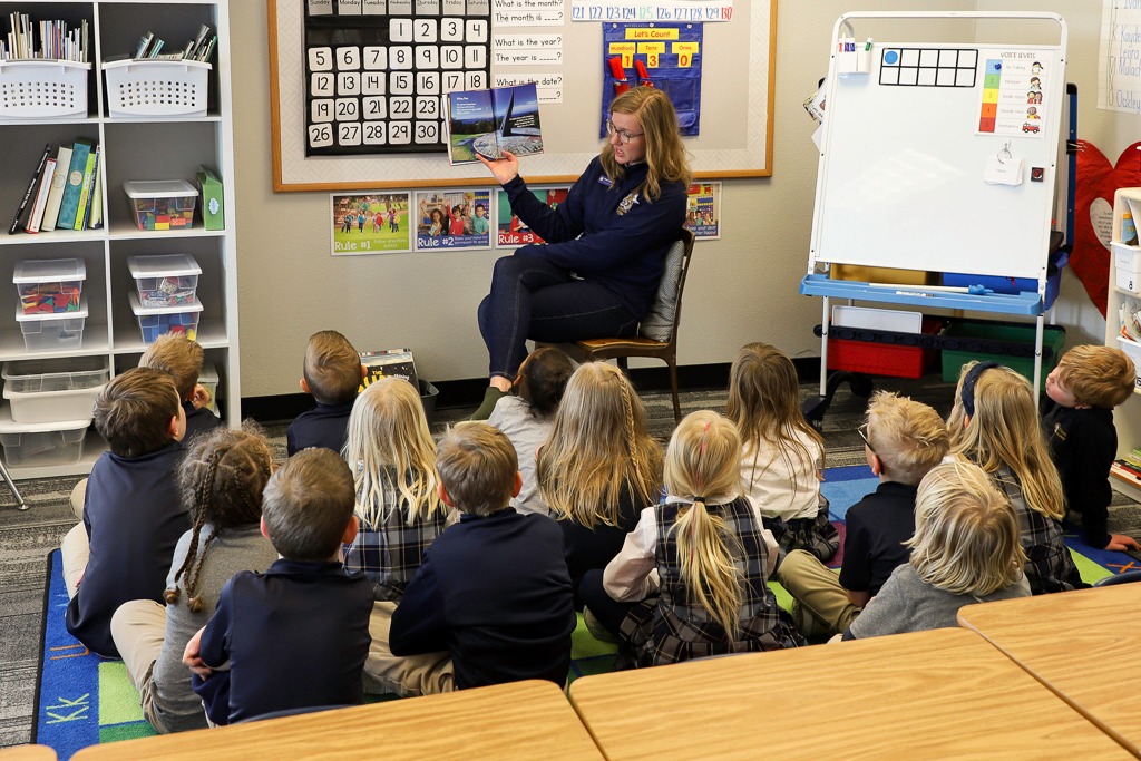 Mrs. Malingen reading to her students