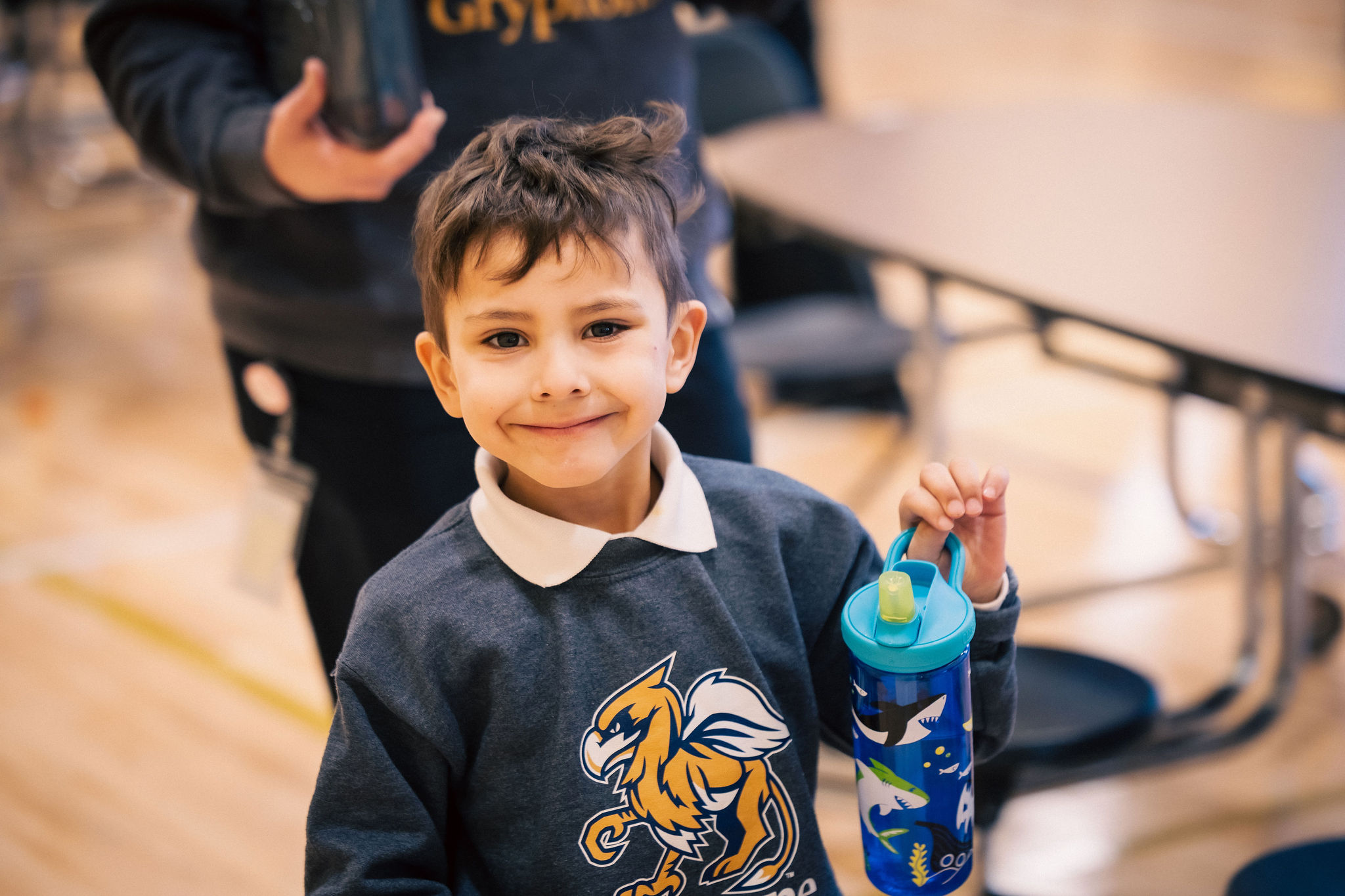 little boy in gryphon gear