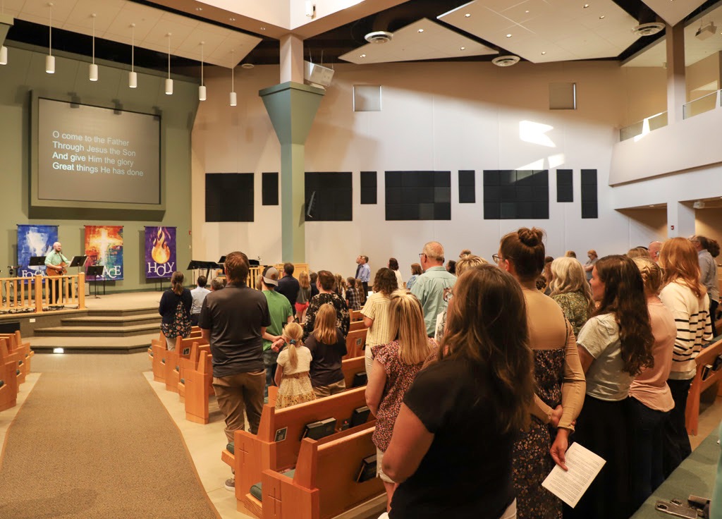 Students and parents singing