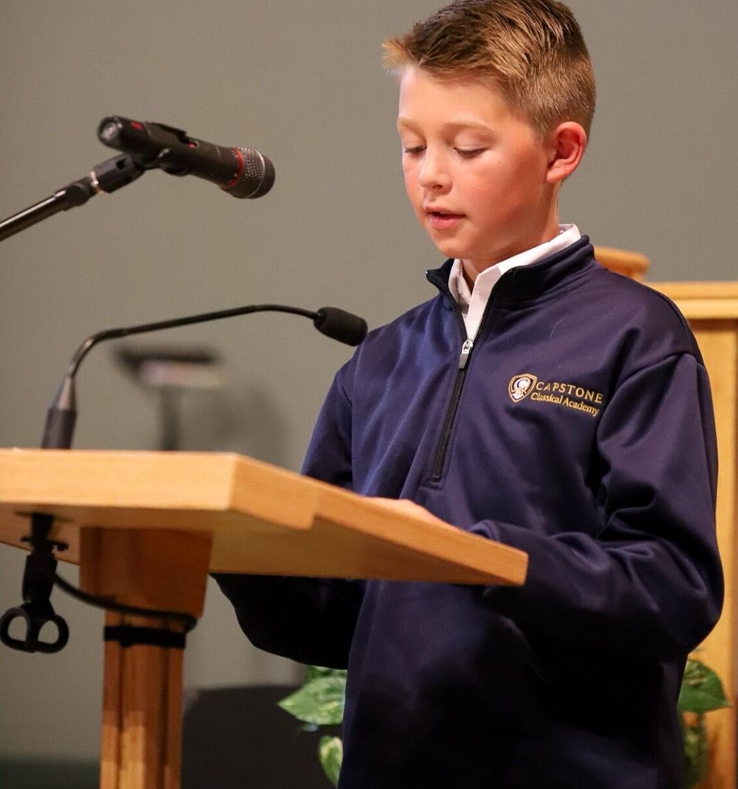 Student speaking from podium