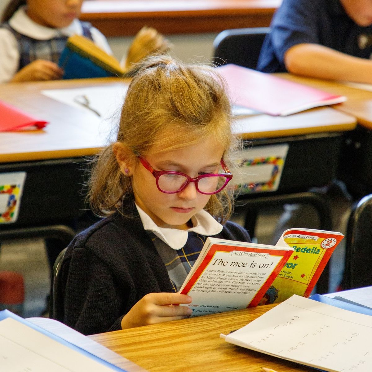 Student reading at her desk